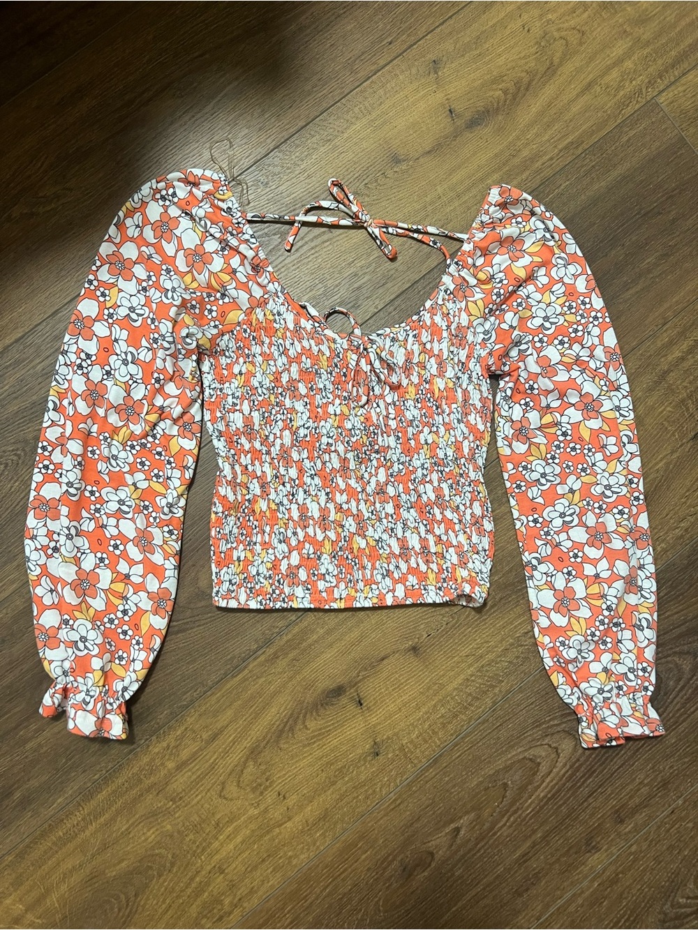 Smocked Floral Long-Sleeve Crop Top in Orange Willow & Root from the Buckle